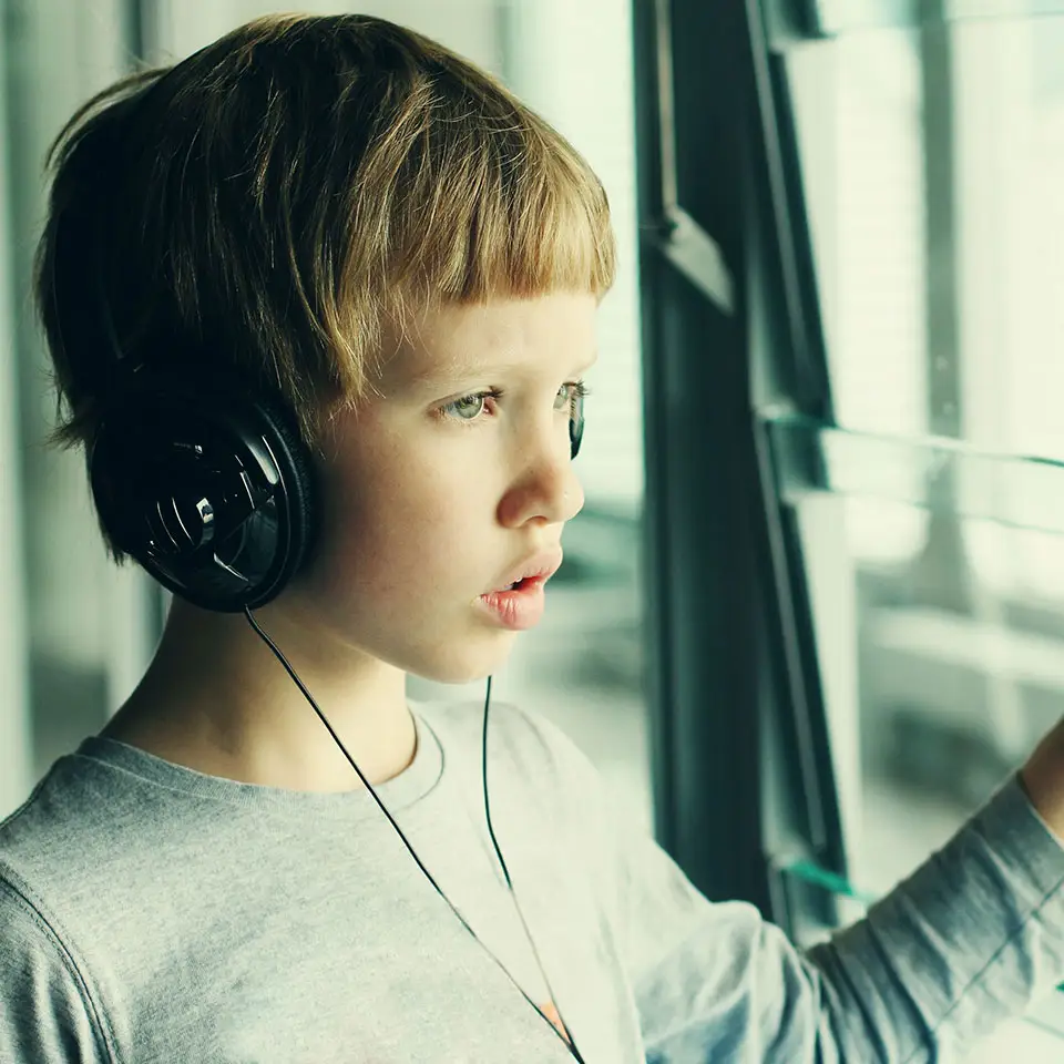 Autistic Child Wearing Headphones