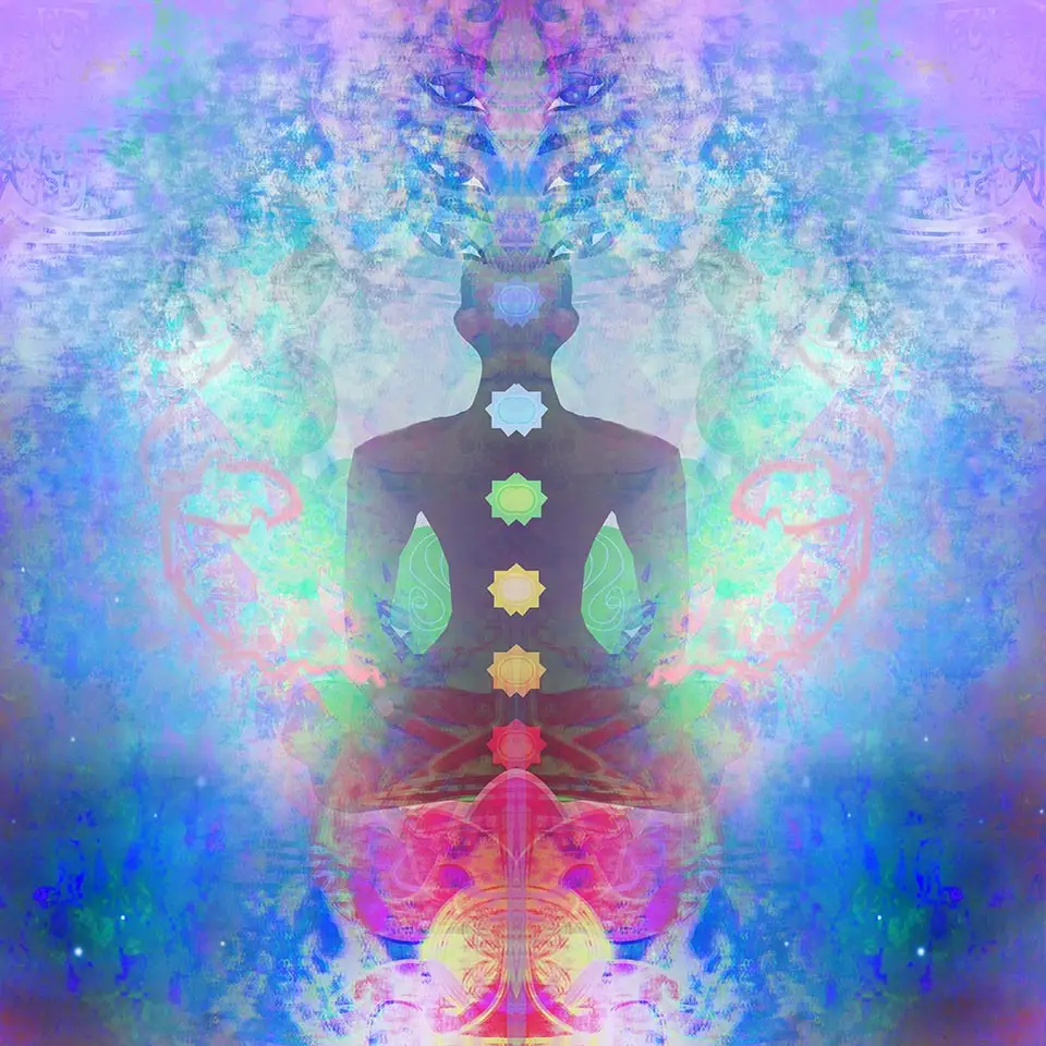 Yoga lotus pose - Padmasana with coloured chakra points