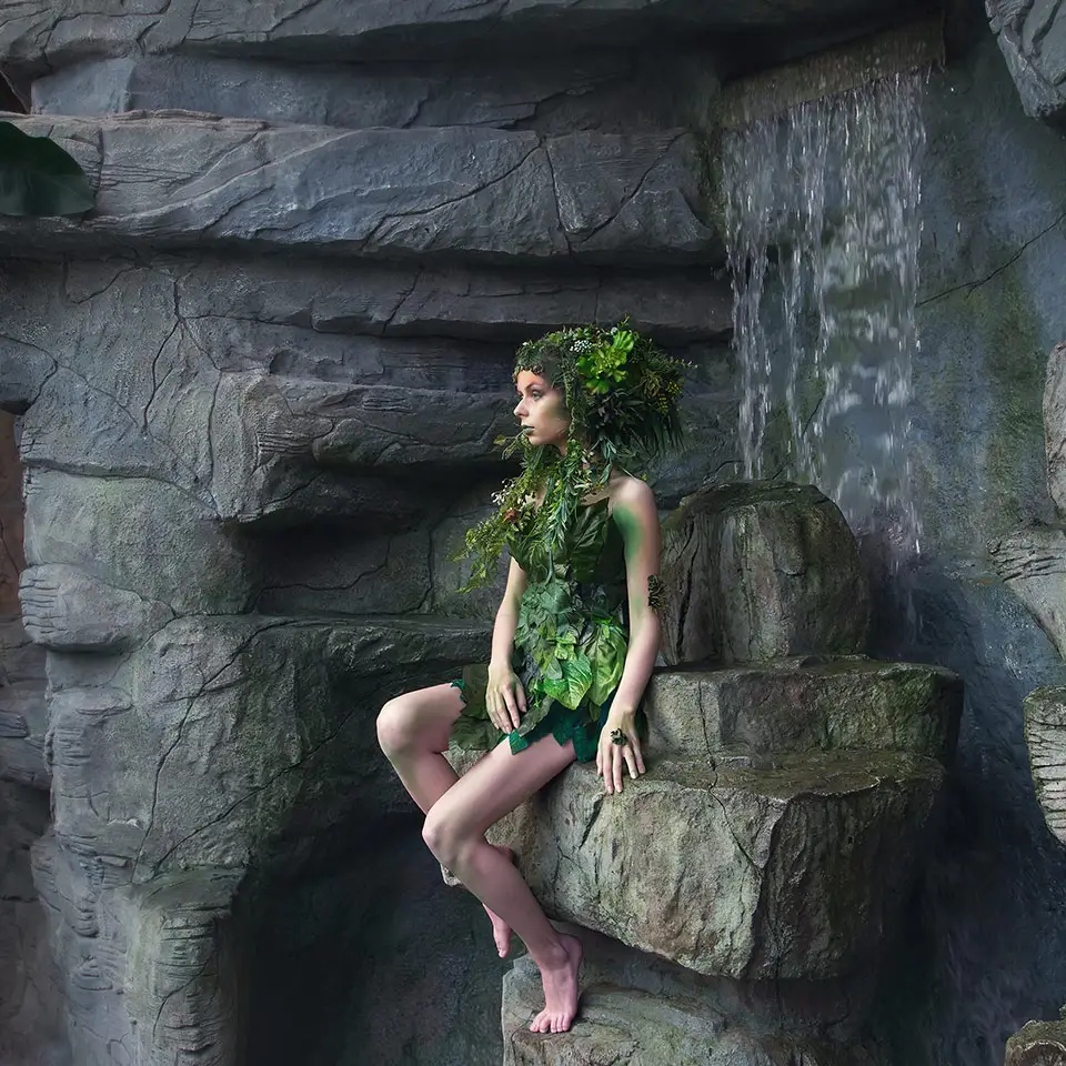 Fairy sitting on a rock