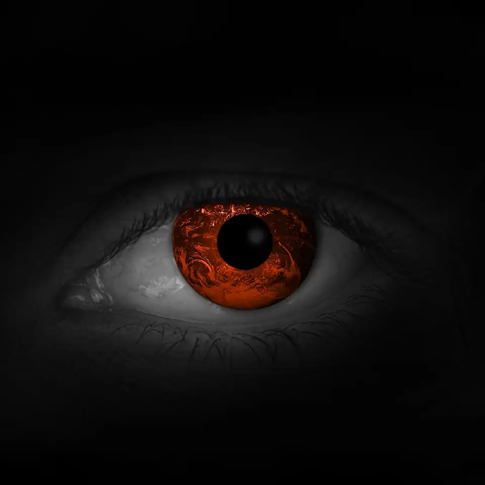 A red eye in shadow