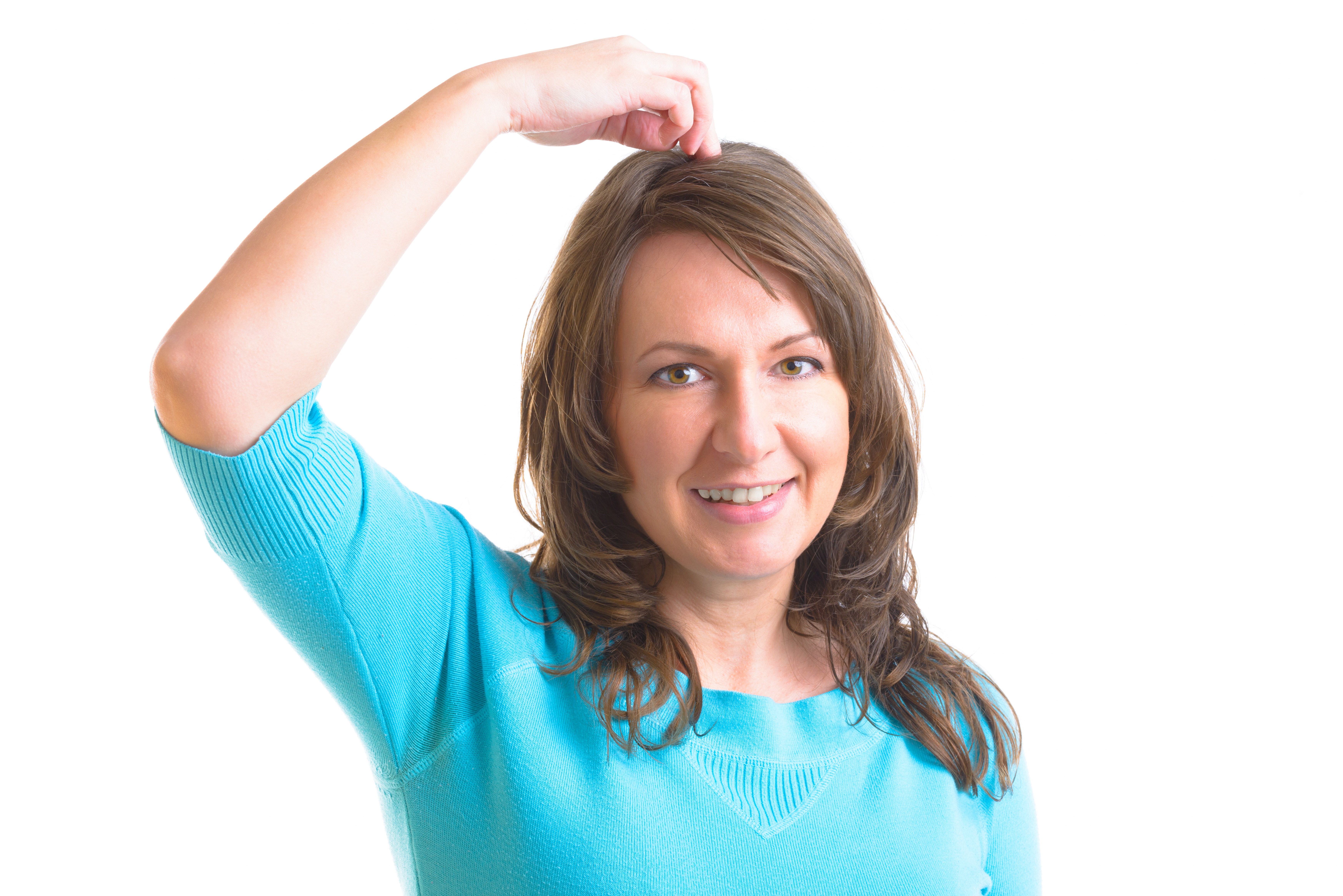 Woman tapping the top of her head