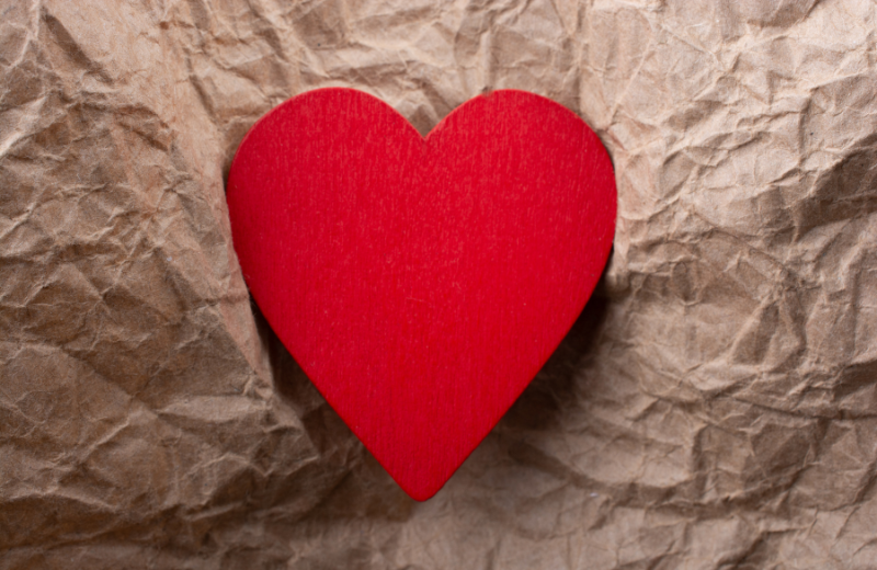 red heart brown background