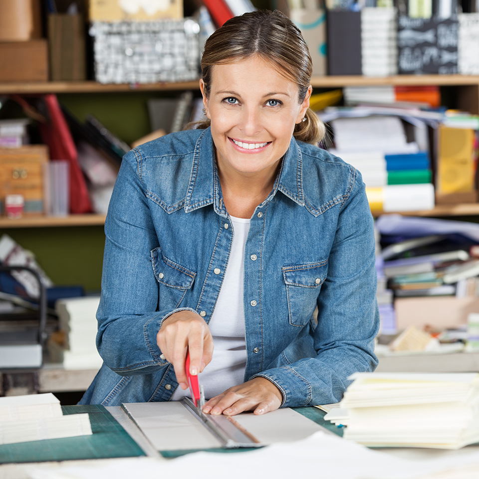 Woman working on papercraft