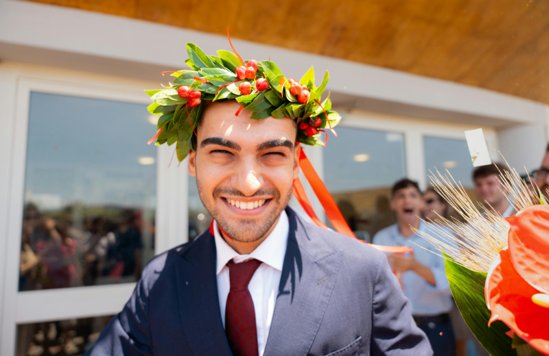 man wearing lauren wreath
