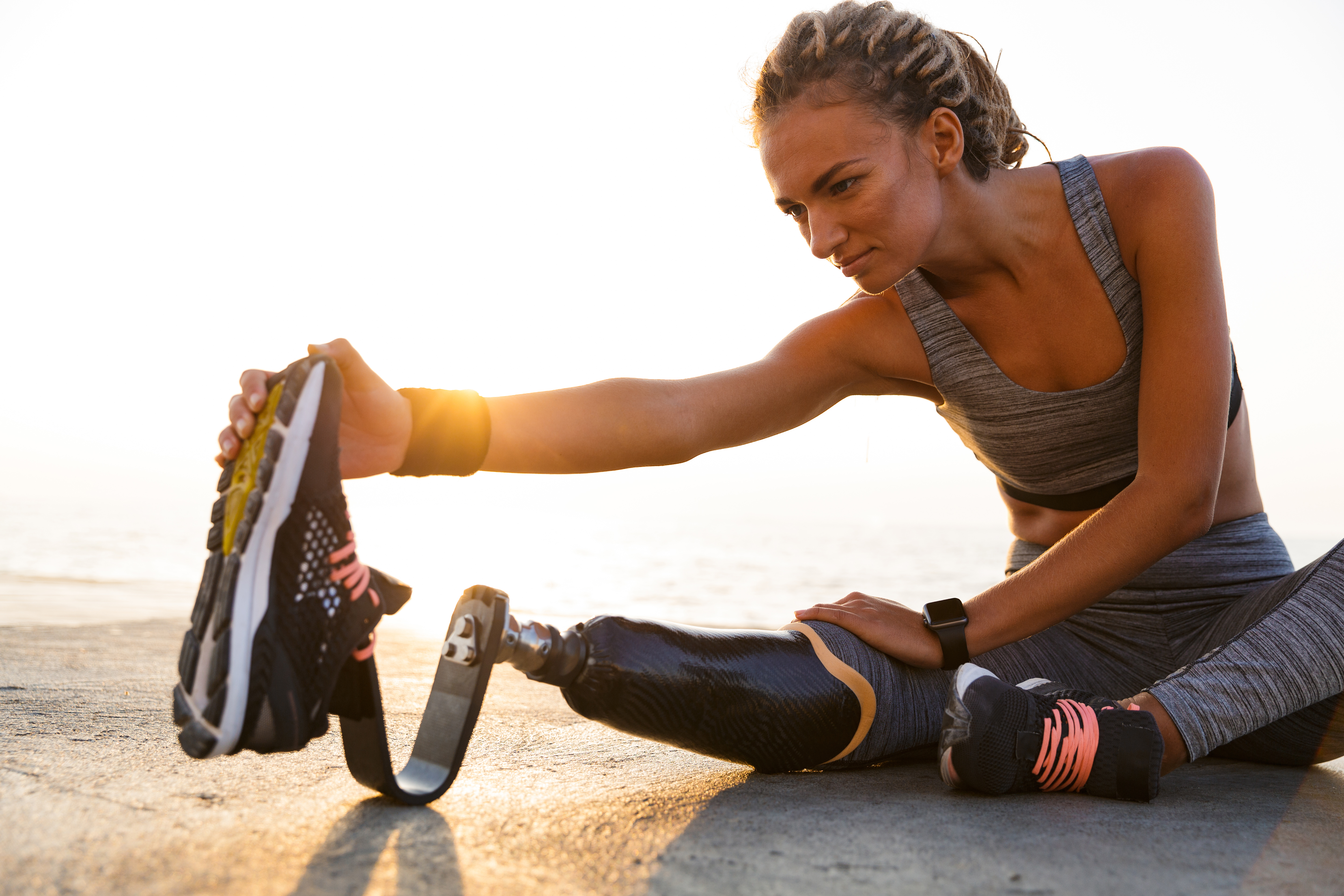 Someone stretching in workout clothing