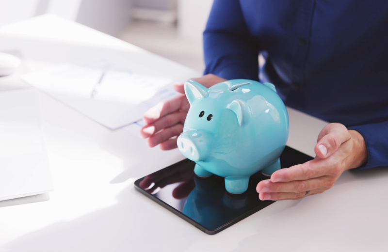 Piggy bank on weighing scales