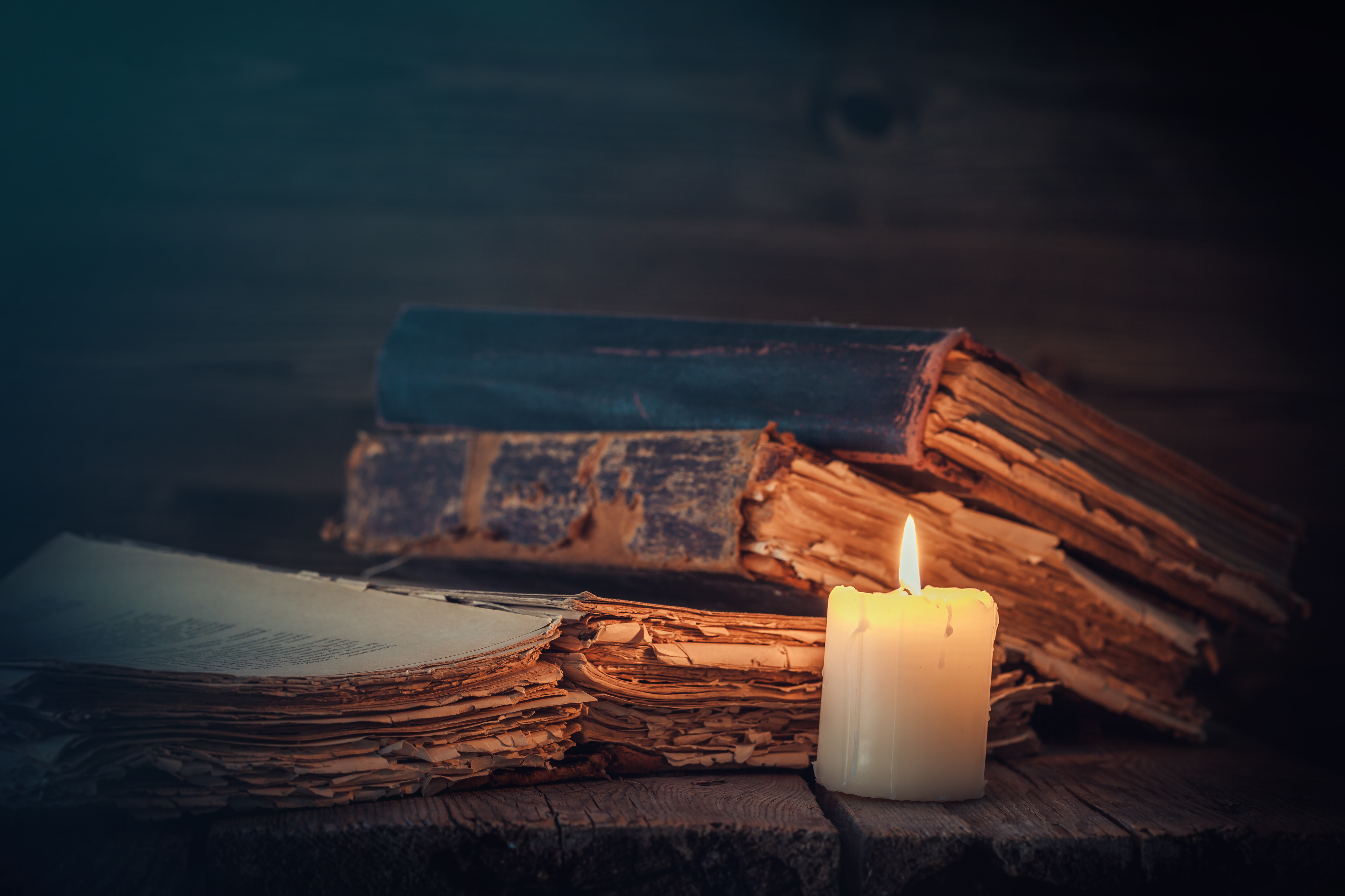 Witches practices, books and lit candle