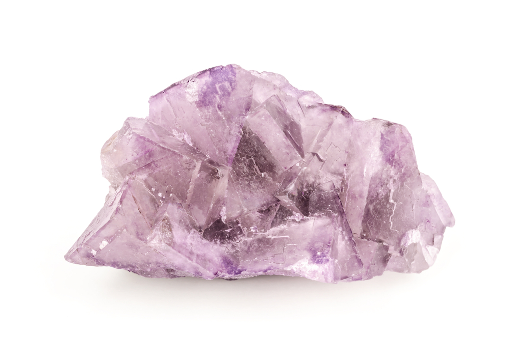 A piece of Pink Flourite on a white background