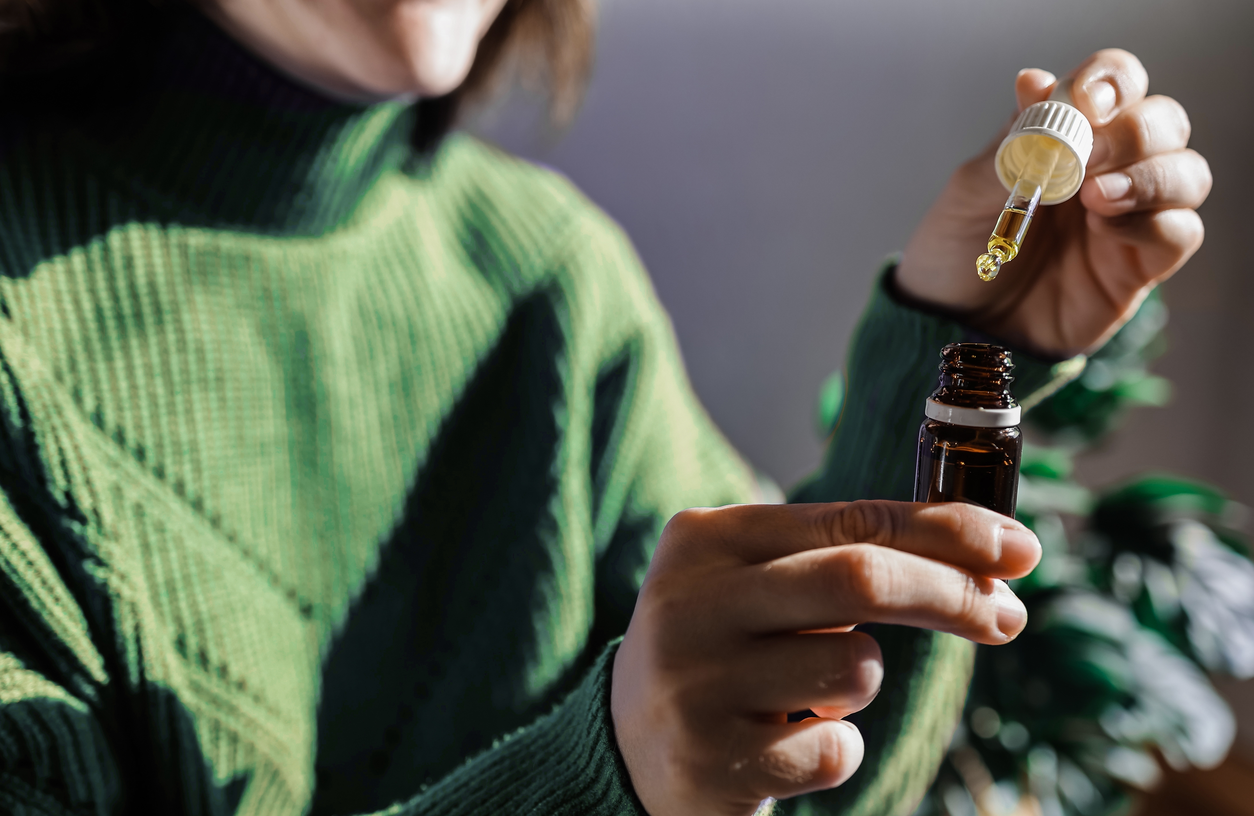 Woman using hemp oil