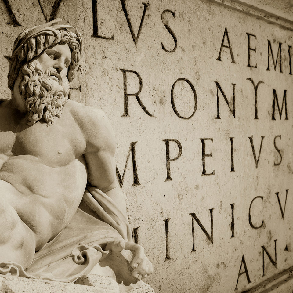 Latin words engraved on a wall in the Roman Capitol.
