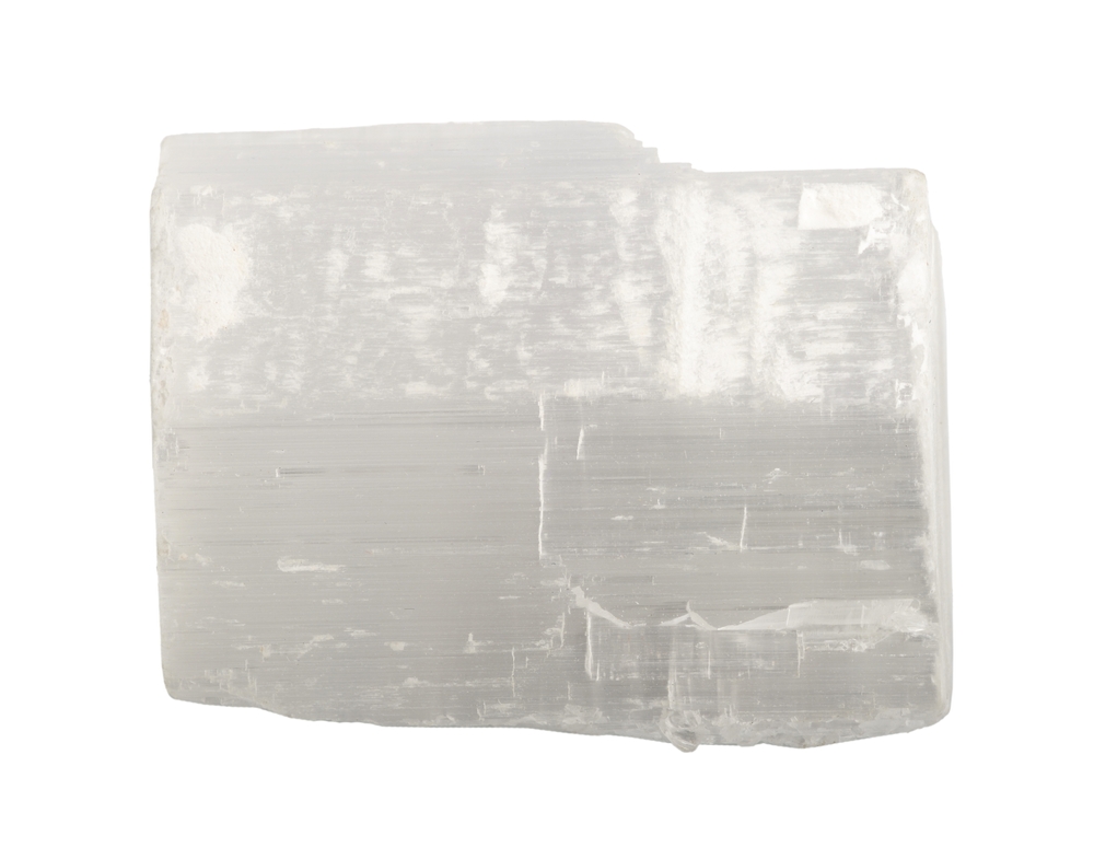A piece of Selenite on a white background