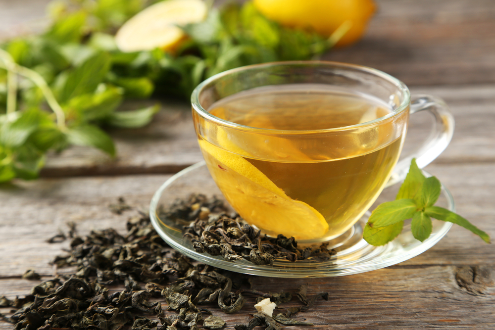 A green tea in a glass mug