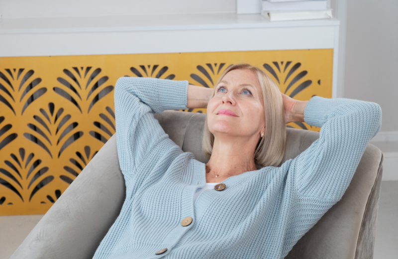 woman relaxing in home on chair