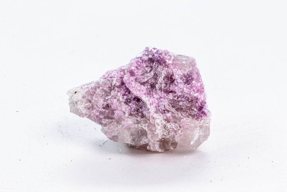 A piece of Lepidolite on a white background