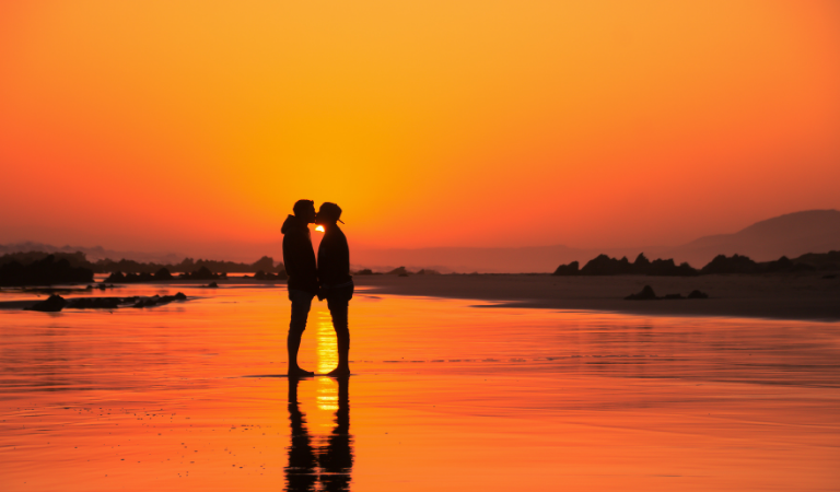 couple in sunset kissing