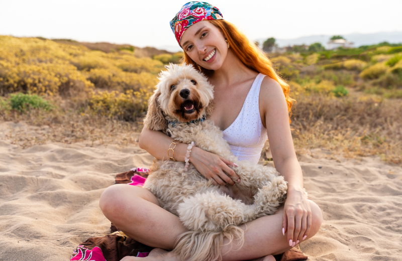 Lady hugging her dog