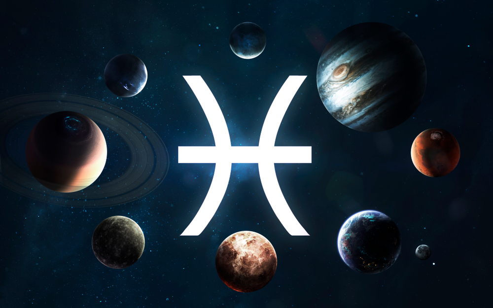 Pisces star sign symbol surrounded by planets