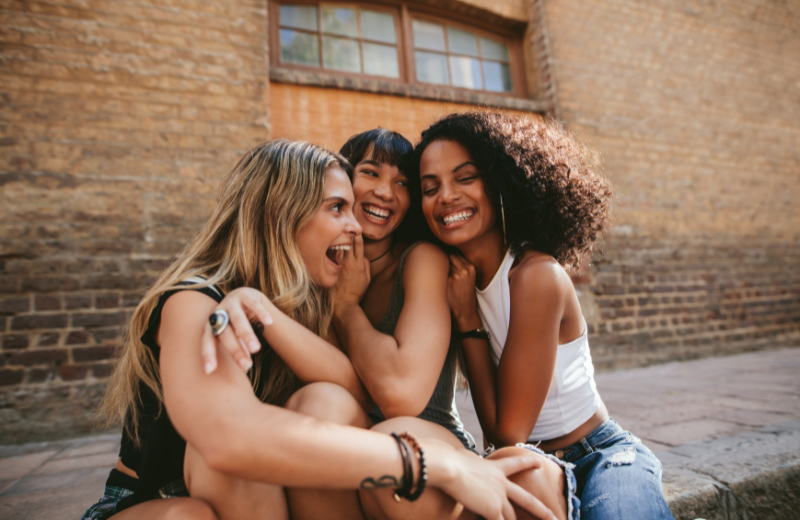 Friend group of females laughing together