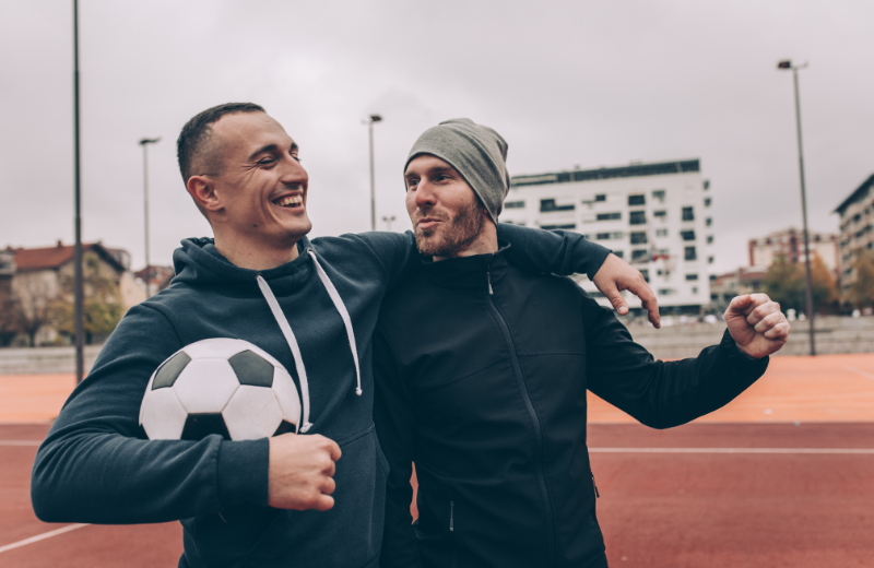 Image of friends supporting eachother.