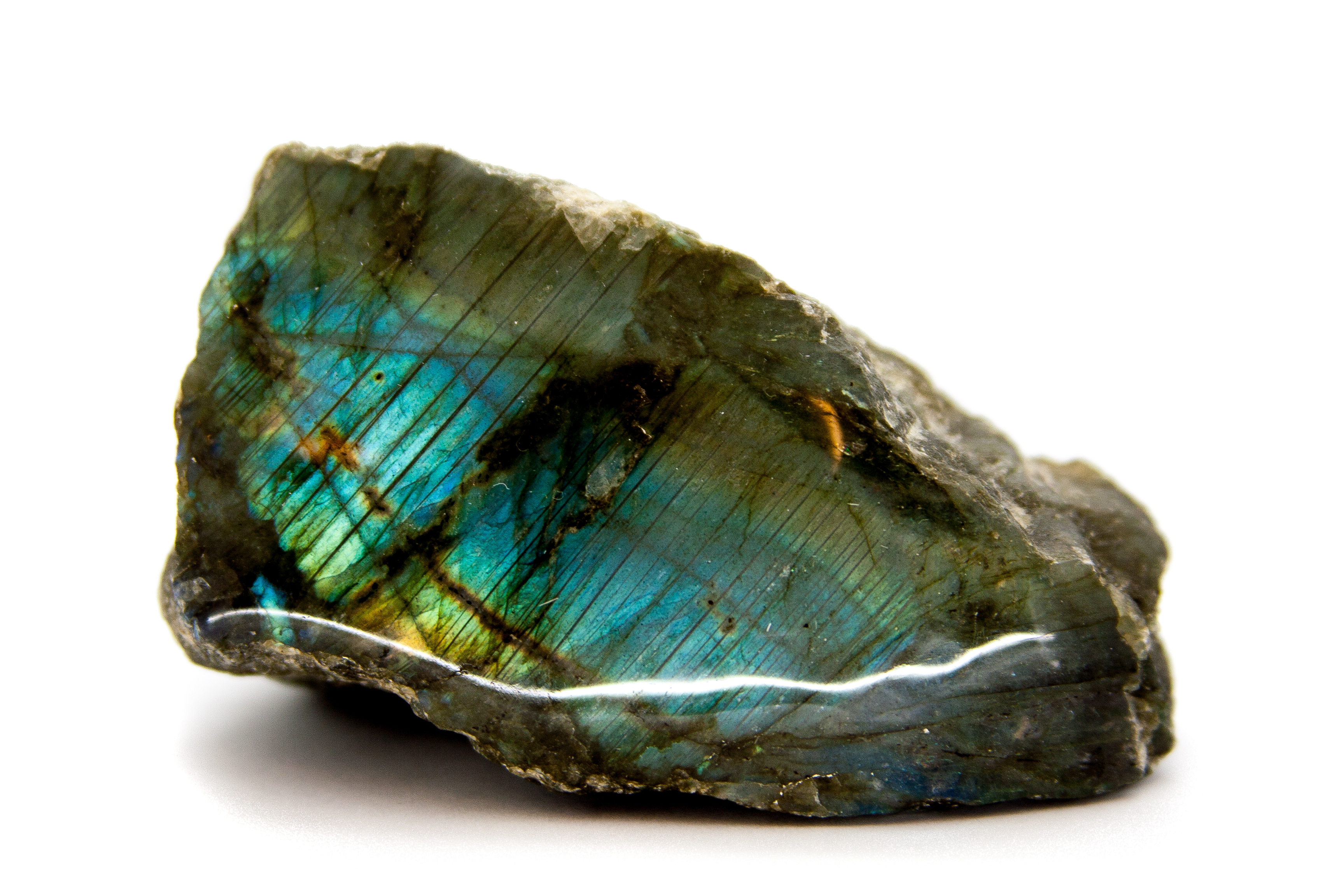 A piece of Labradorite on a white background