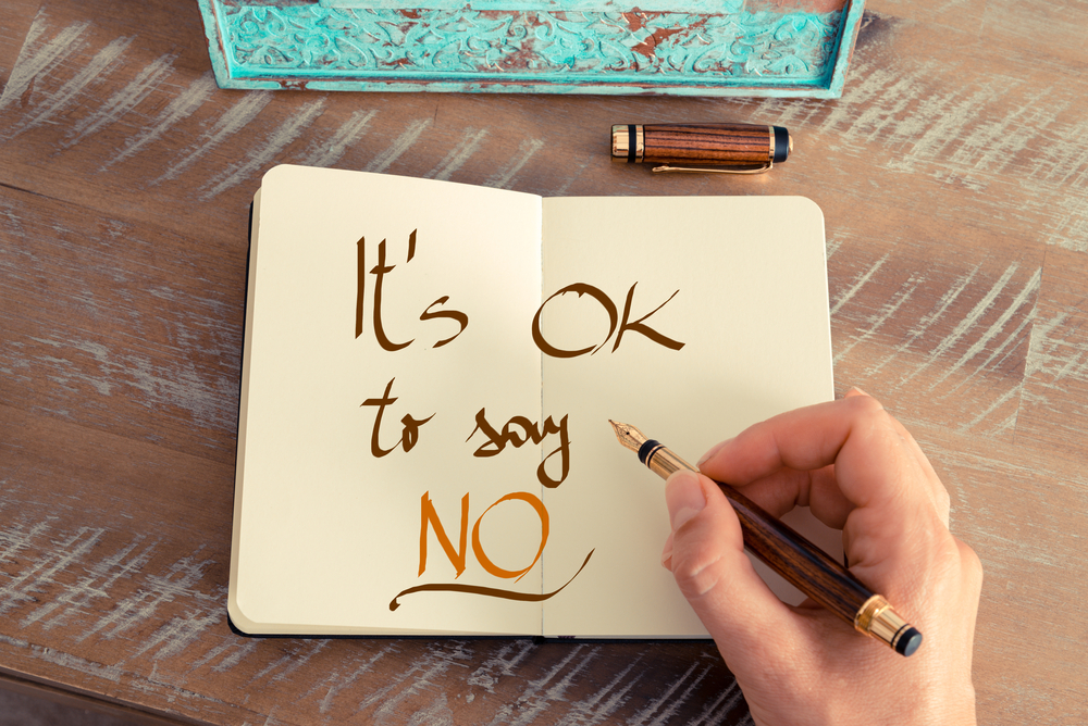 'It's ok to say no' written in a journal