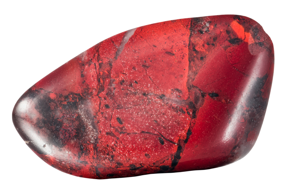 A piece of Red Jasper on a white background