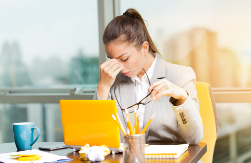 Woman stressed at work
