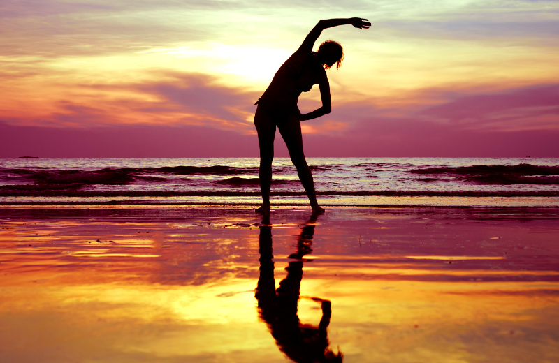 Stretching on the beach