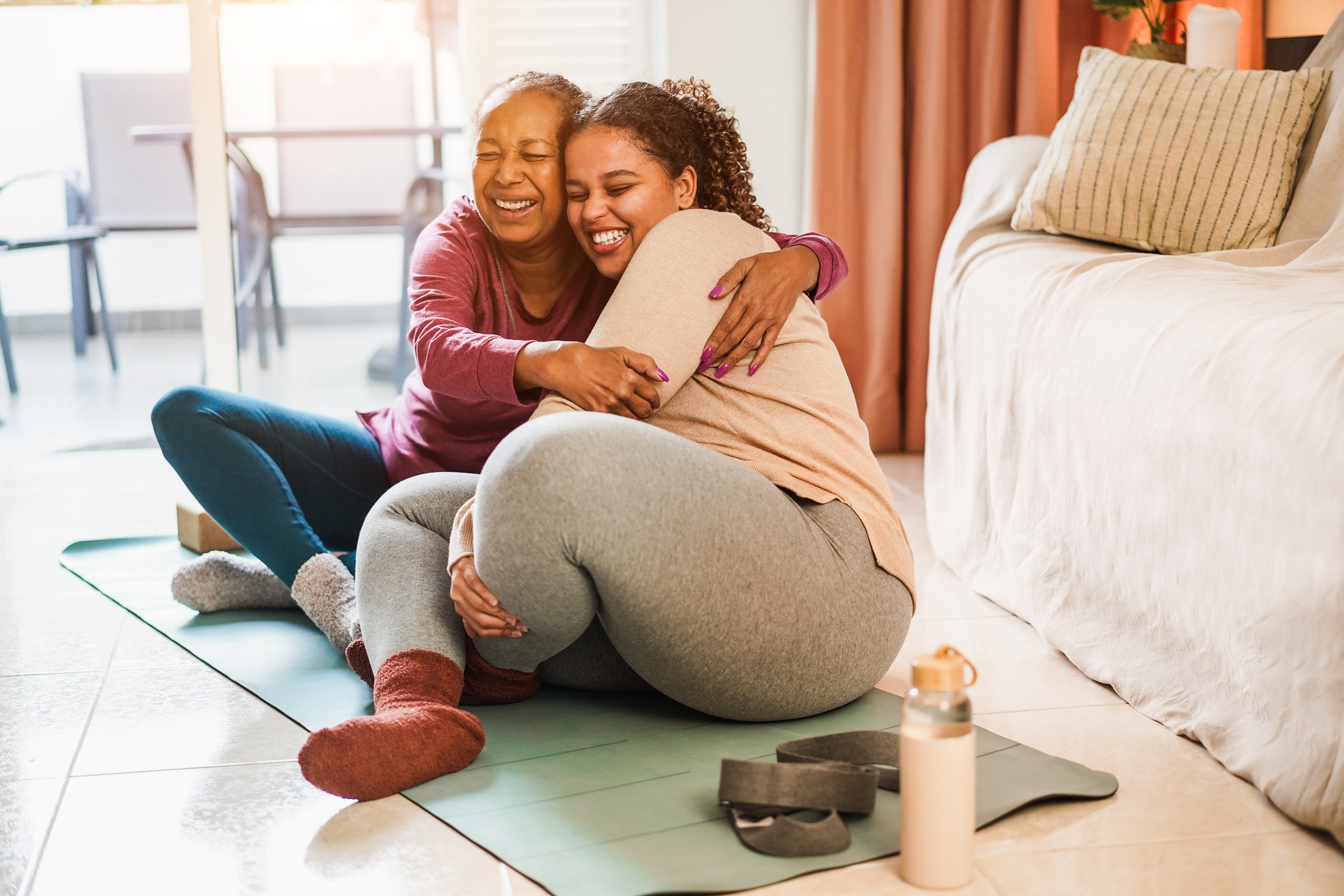 Plus sized women doing yoga smiling