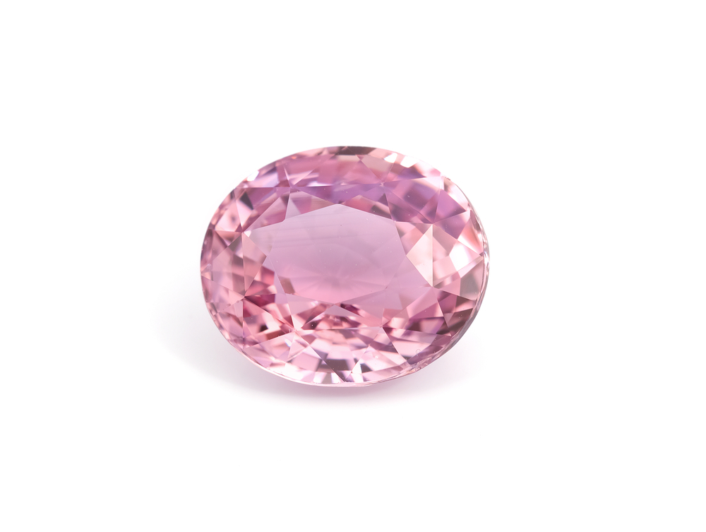 A piece of Pink Sapphire on a white background