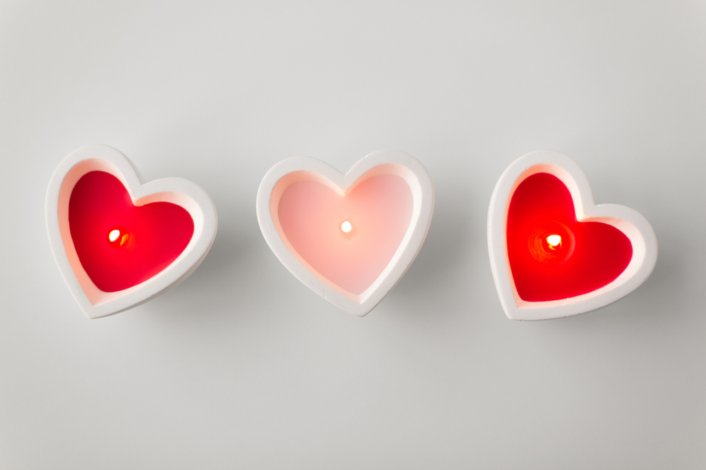 Three heart shaped candles