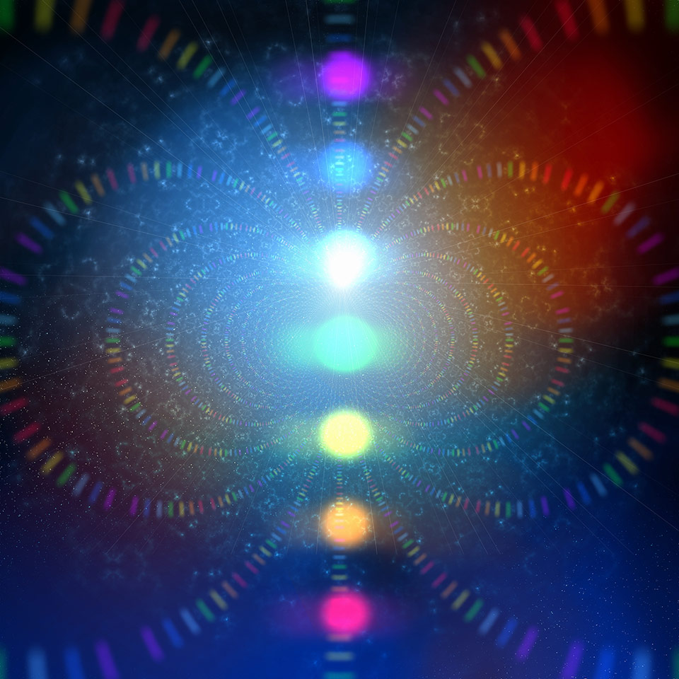 Illustration of the 7 chakras presented as coloured glowing orbs of light
