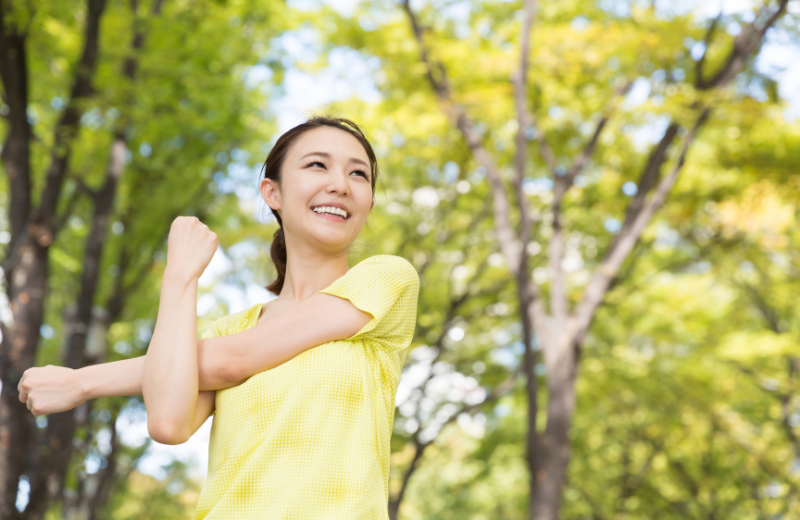 Someone stretching outdoors
