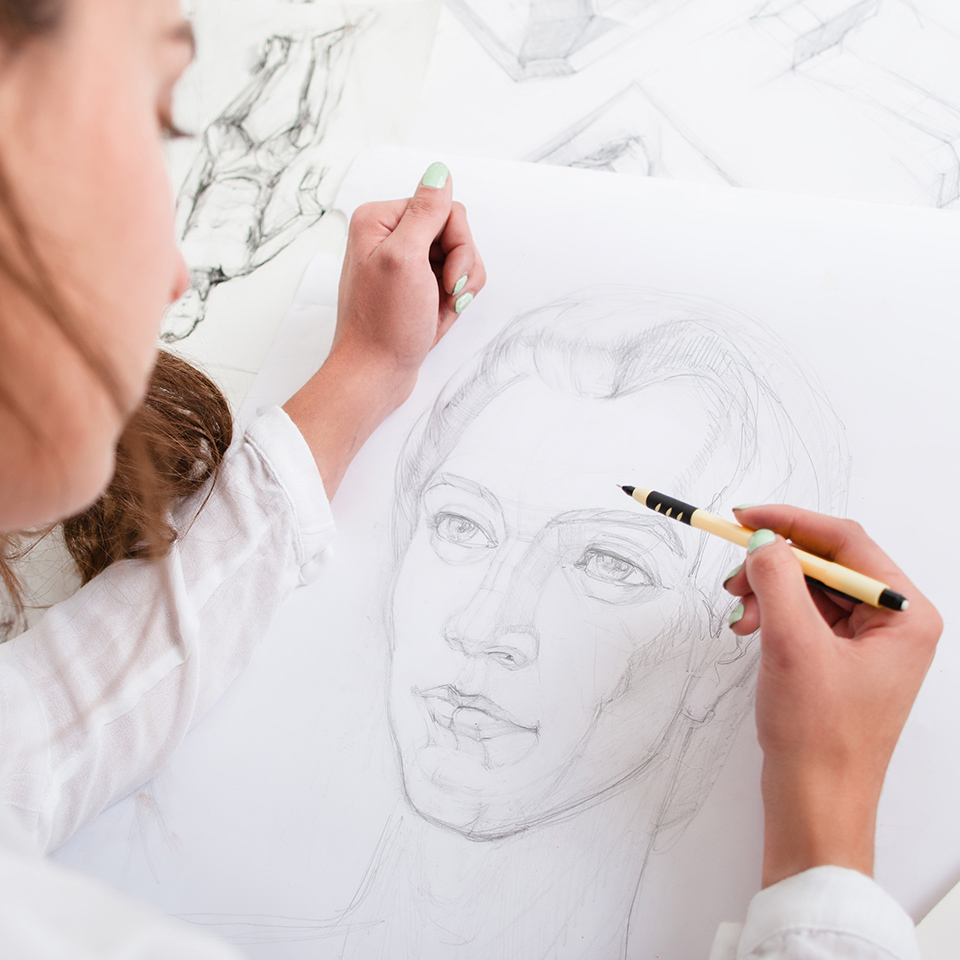 Artist drawing pencil portrait