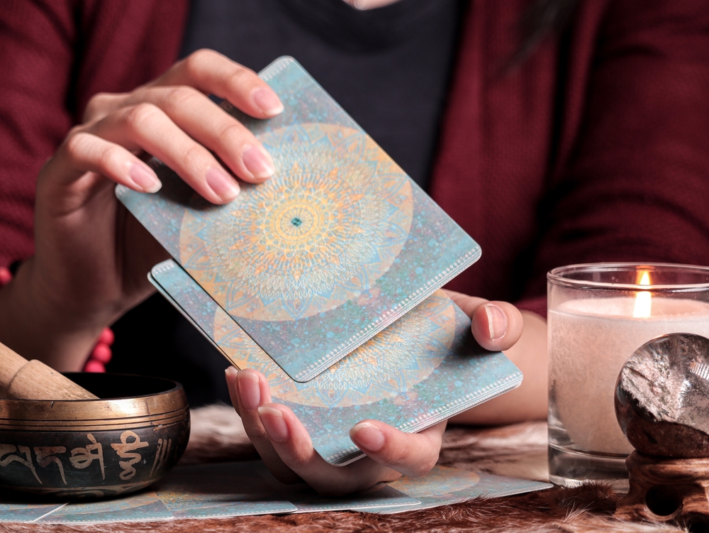 A deck of tarot cards being shuffled