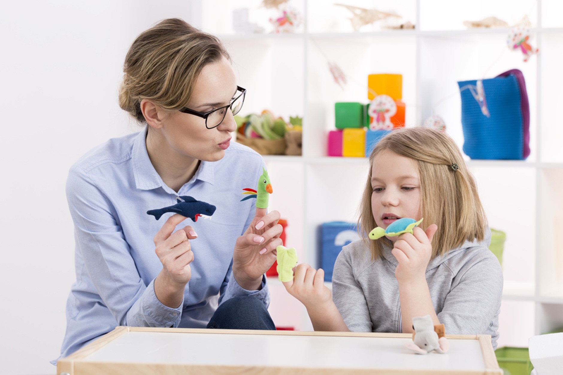 A person and a child brushing their teeth
Description automatically generated with low confidence