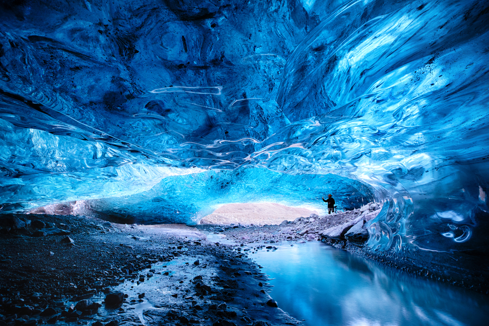 Inside a blue glacial ice cave in the glacier. Breioarmerkurjokull, part of the Vatnajokull glacier in southeast Iceland.