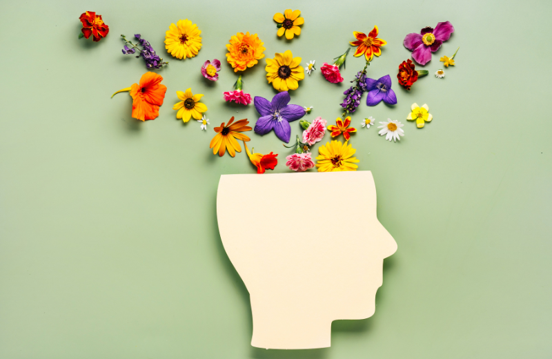 artwork with flowers coming out of the mind