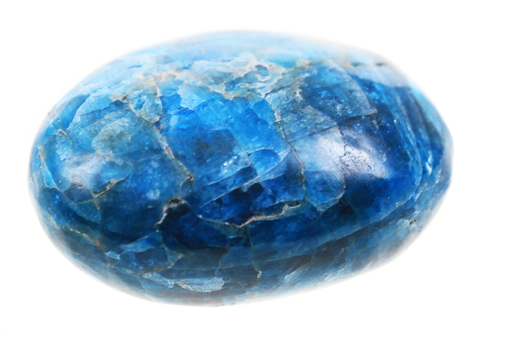A piece of Blue Apatite on a white background