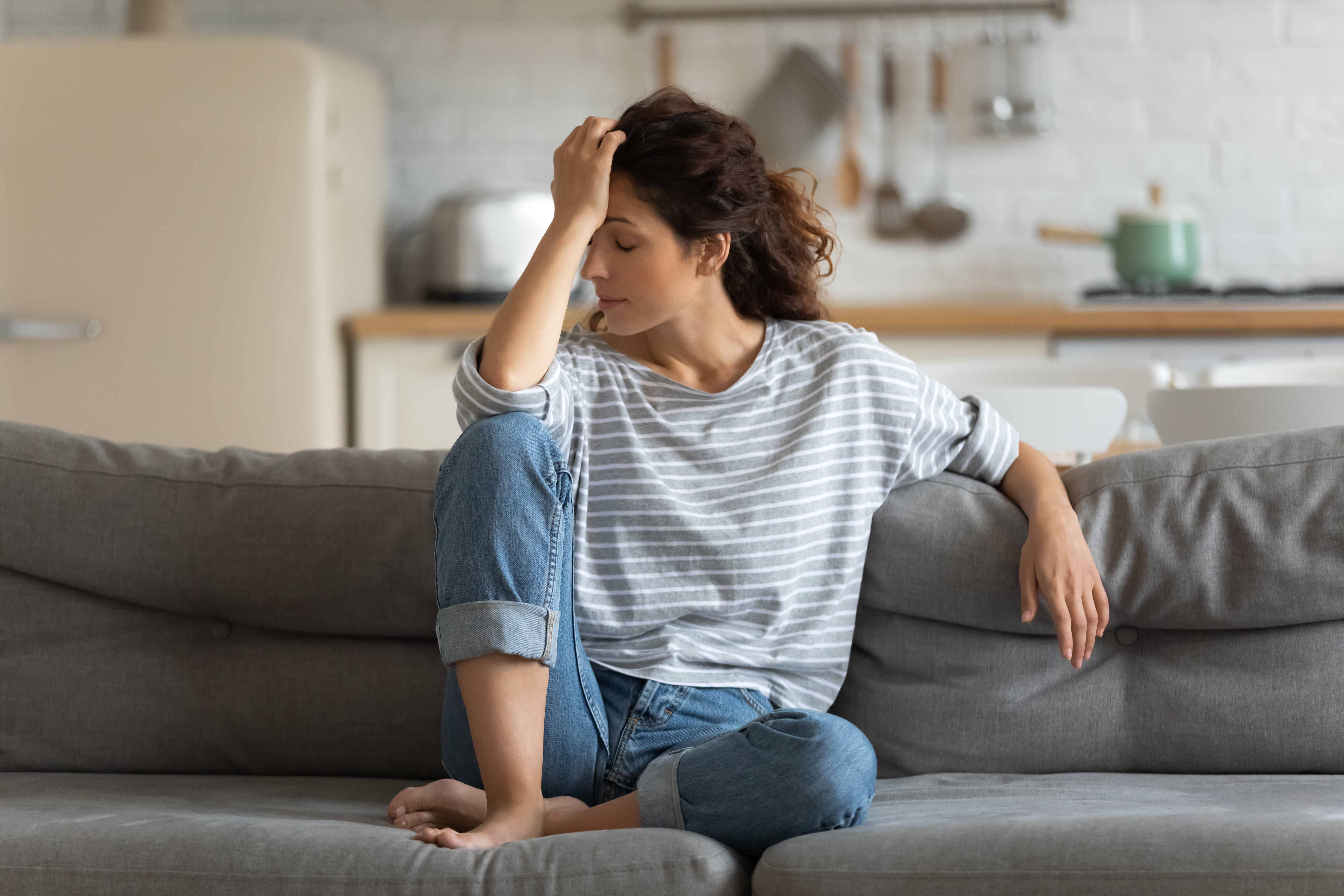 Woman feeling emotionally overwhelmed