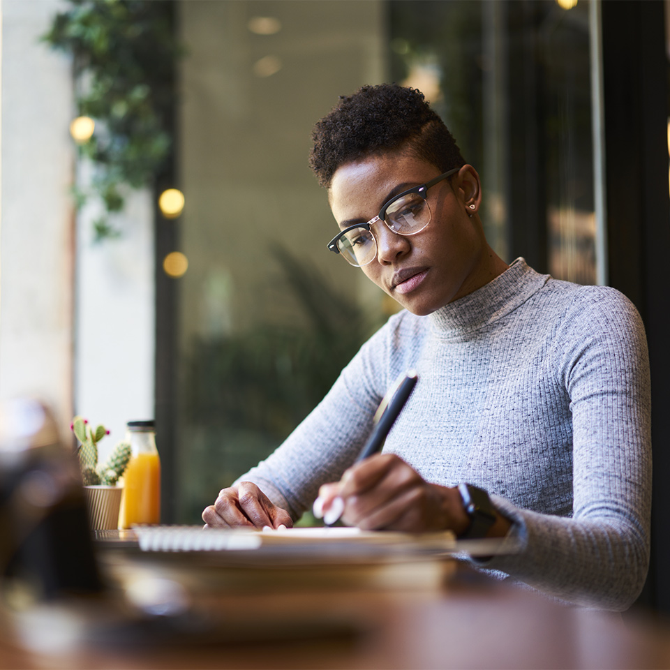 Writer working in a cafe