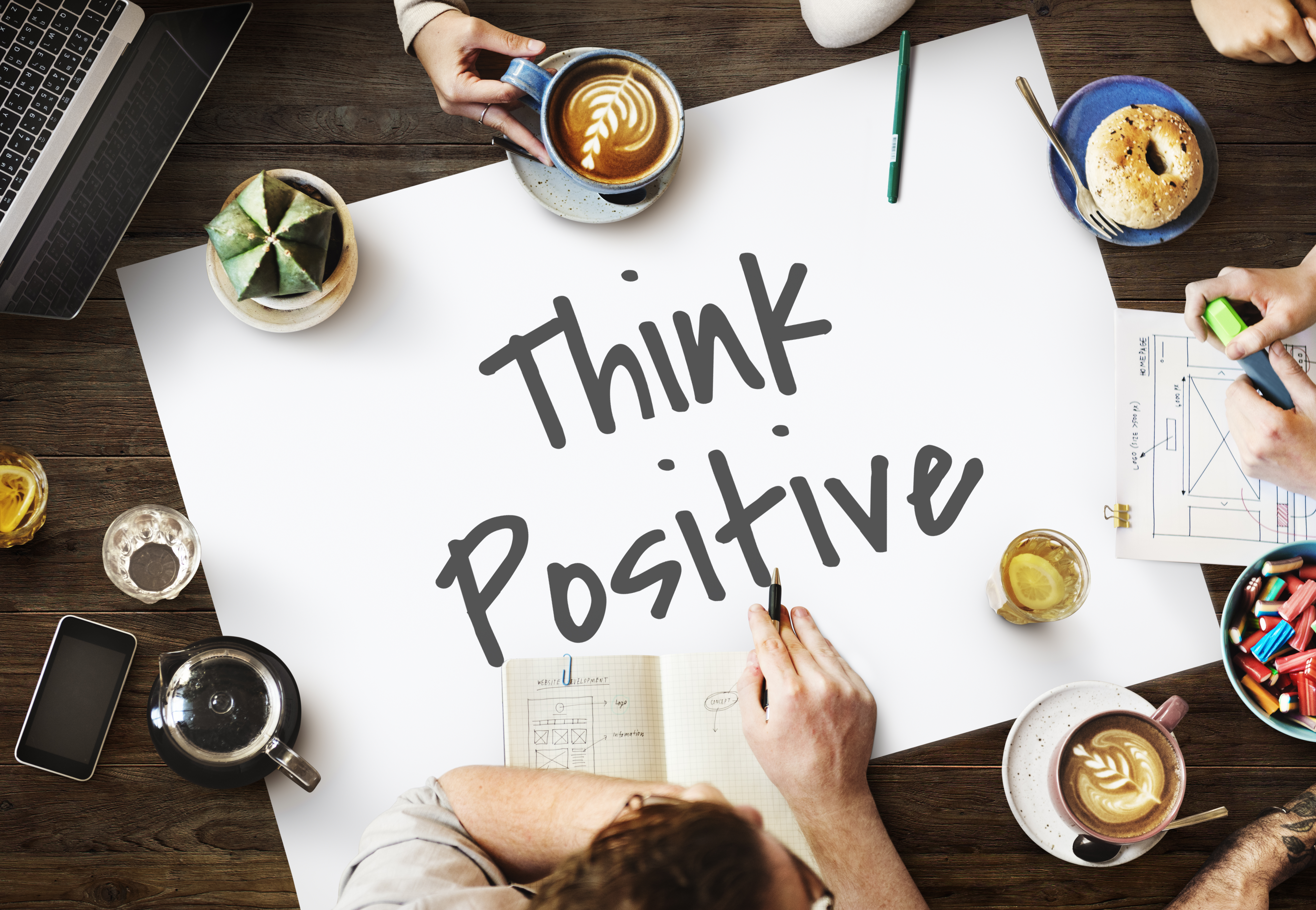 Image of a sign that says 'Think Positive'