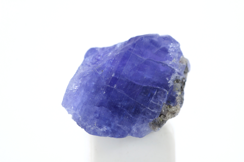 A piece of Tanzanite on a white background