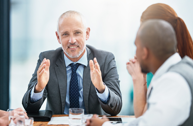 An image of a businessman talking expressively.