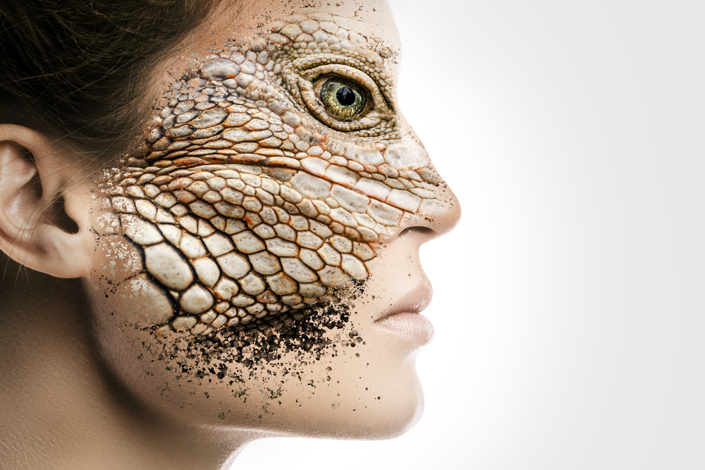 A face that is half woman, half reptile