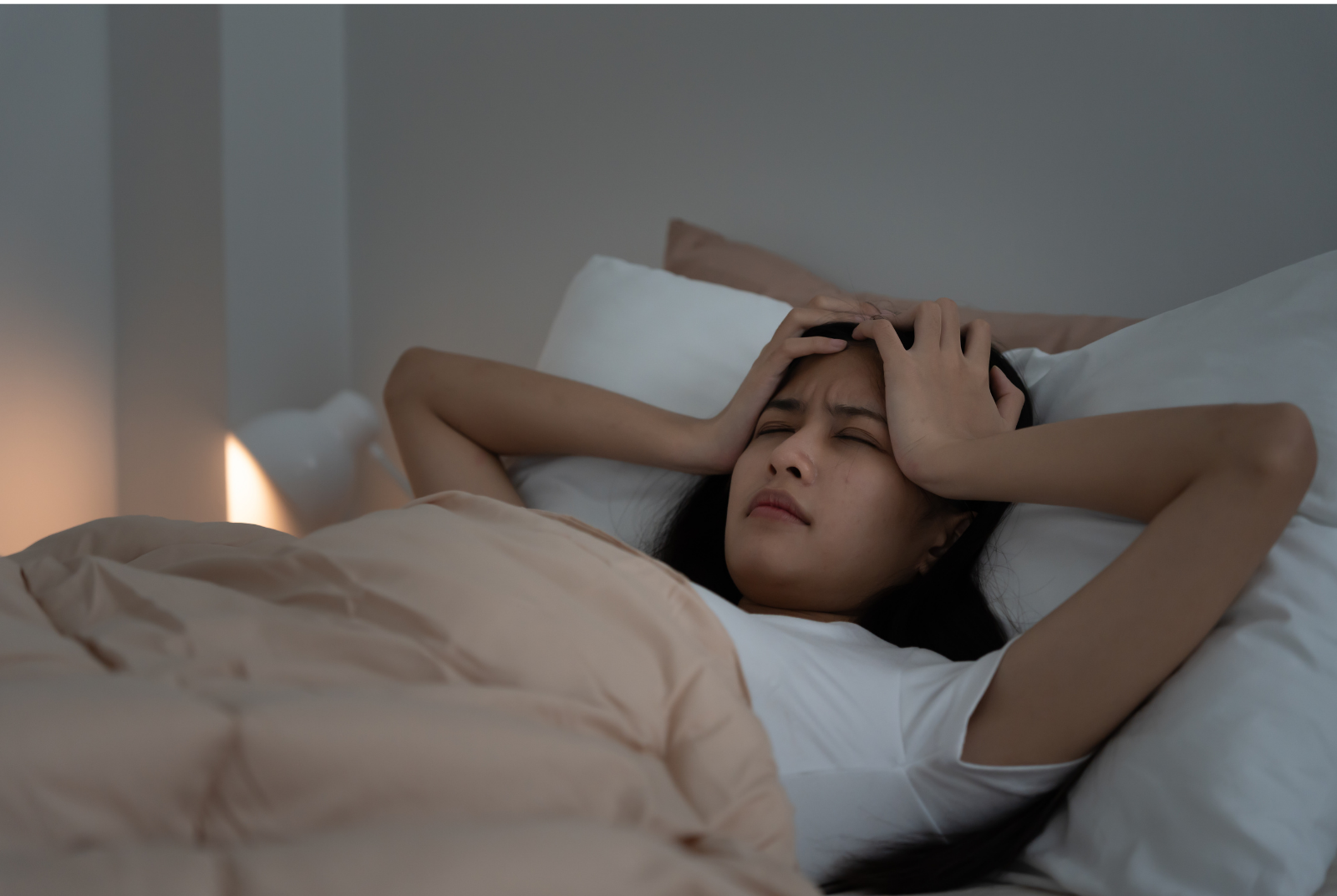 woman awake after nightmare