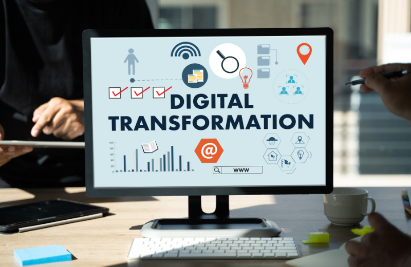 Image of a computer with 'Digital Transformation' written on the screen.