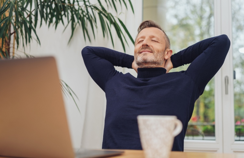 Man leaning back in a chair