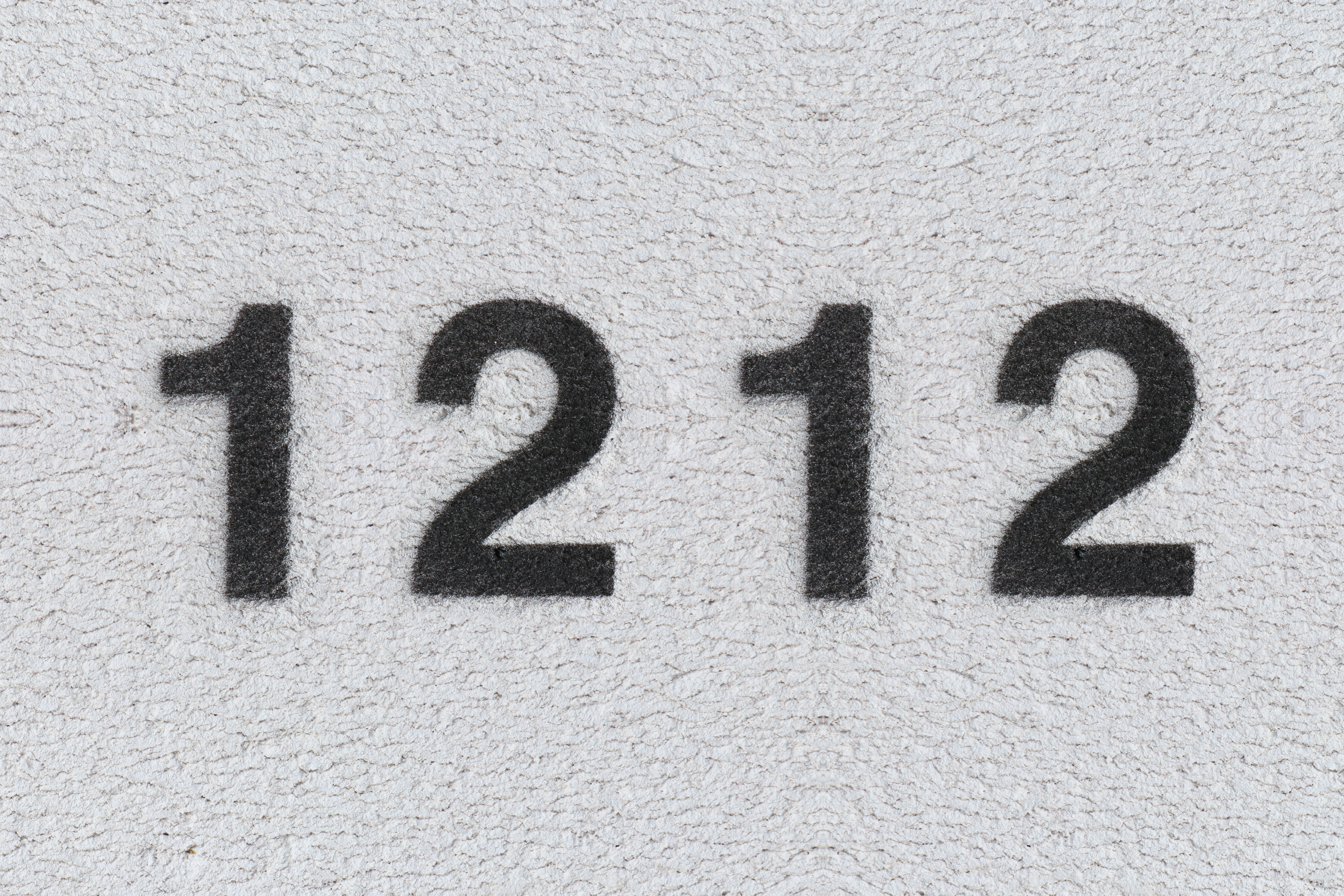 1212 written in black on a white background