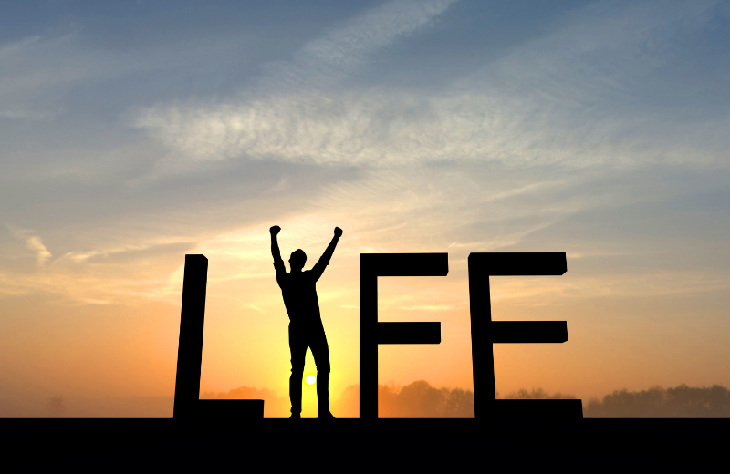 Image of a sunset with the word 'life.'